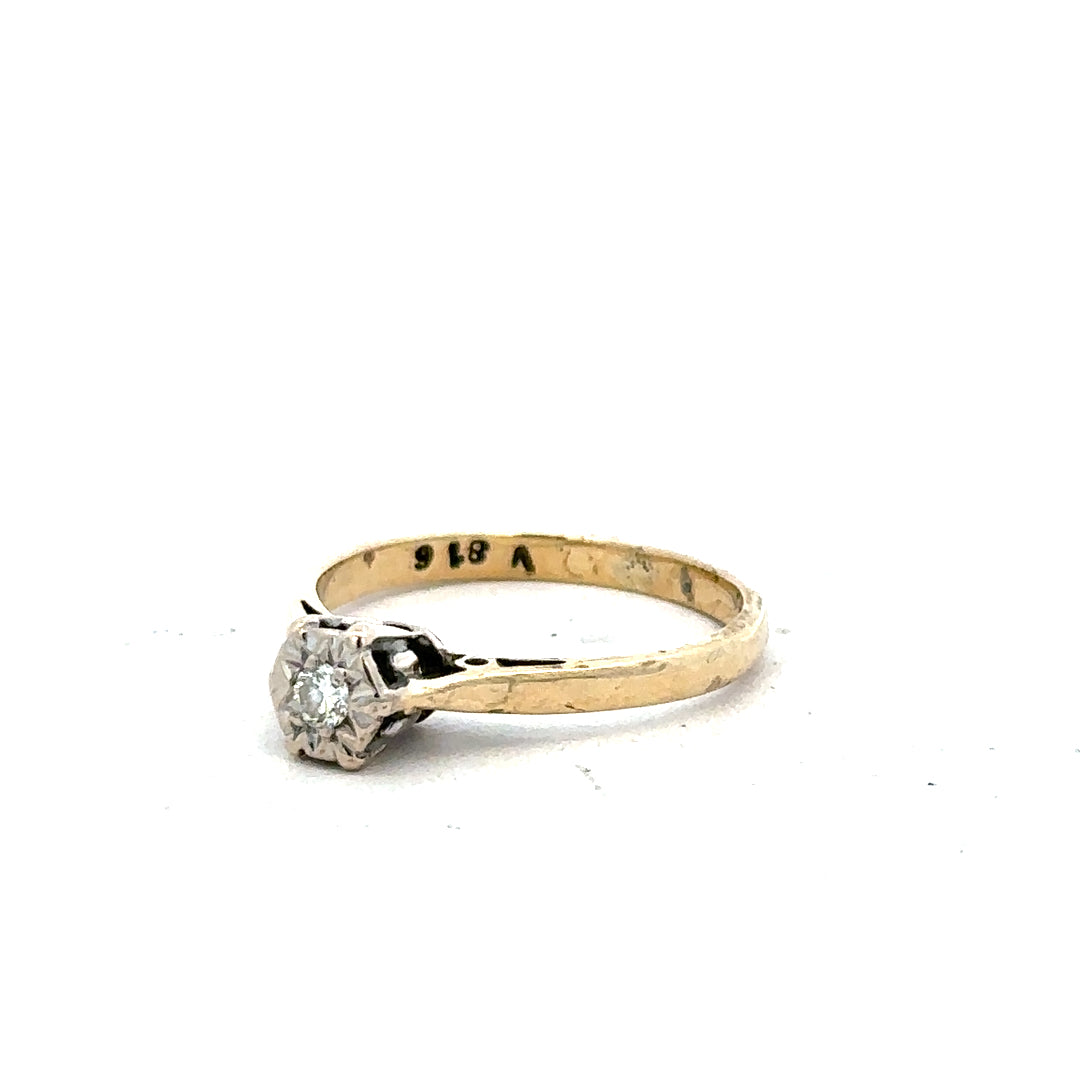 9ct yellow gold diamond ring in size K with sparkling diamonds, showcasing elegant jewelry design.