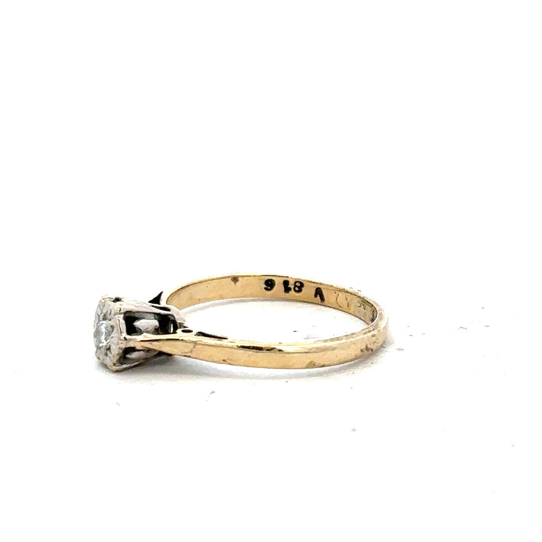 9ct yellow gold diamond ring in size K with sparkling diamonds, unbranded jewelry piece displayed on a white background.