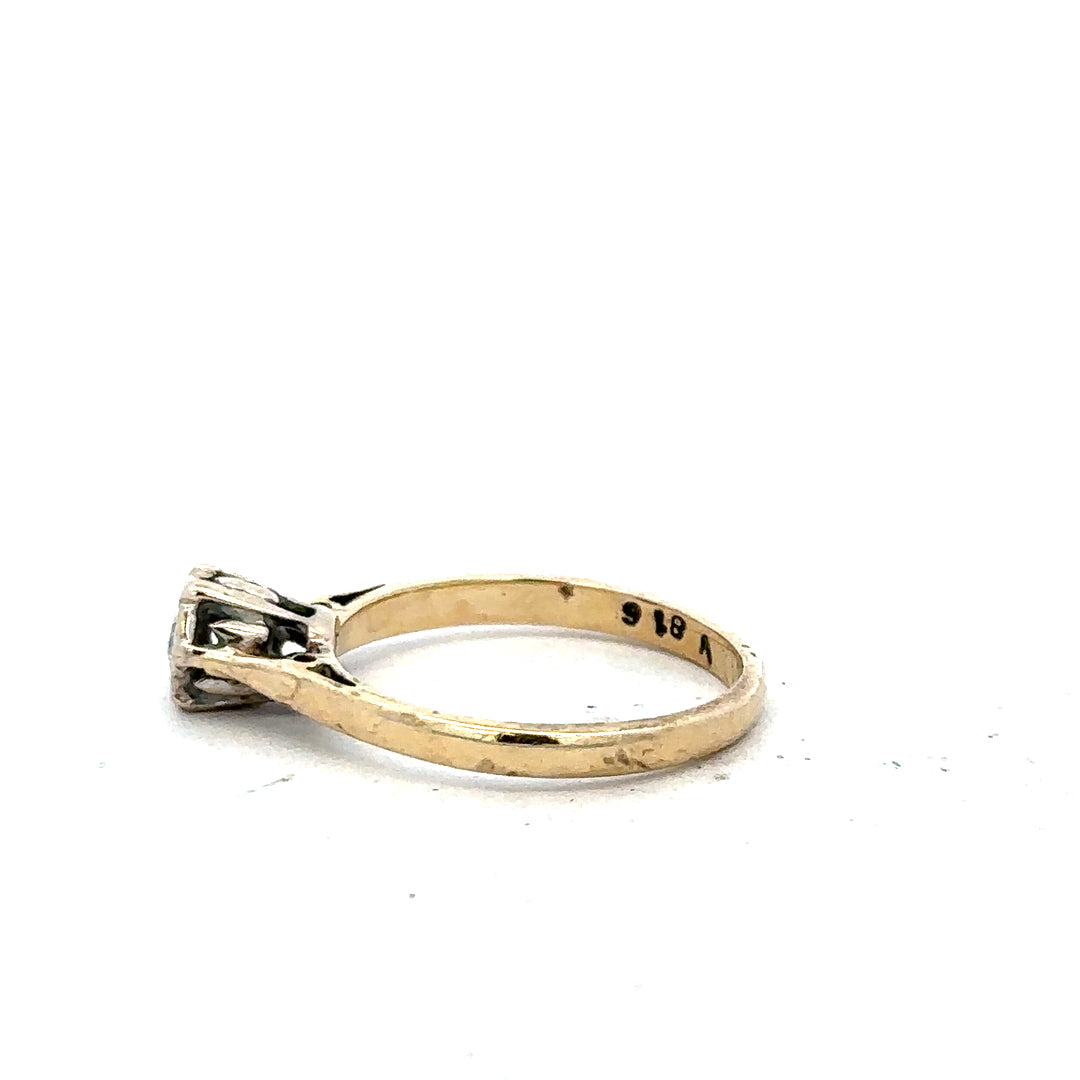 9ct yellow gold diamond ring in size K with sparkling diamonds, showcasing elegant jewelry craftsmanship.