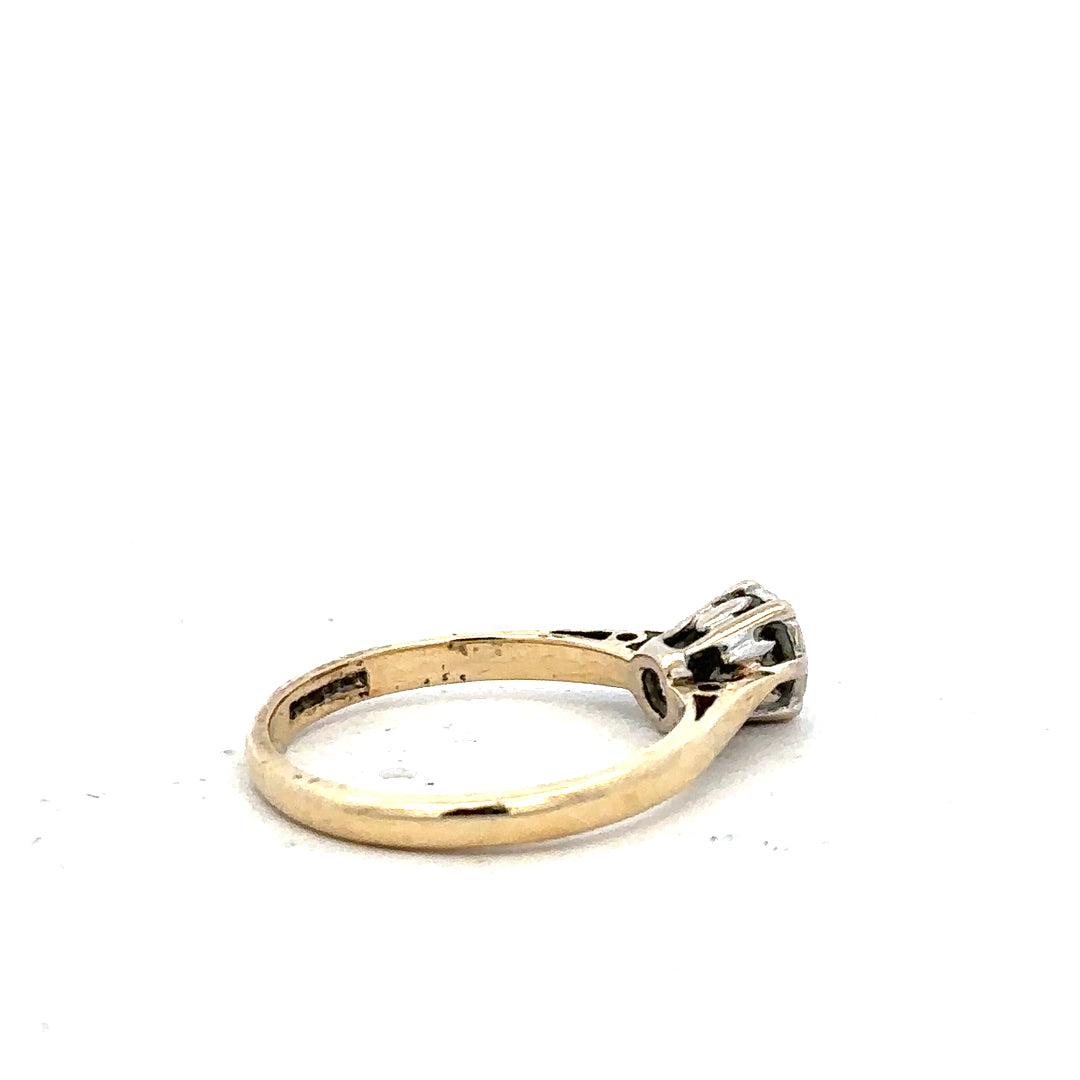 9ct yellow gold diamond ring, size K, featuring sparkling diamonds set in a sleek band.