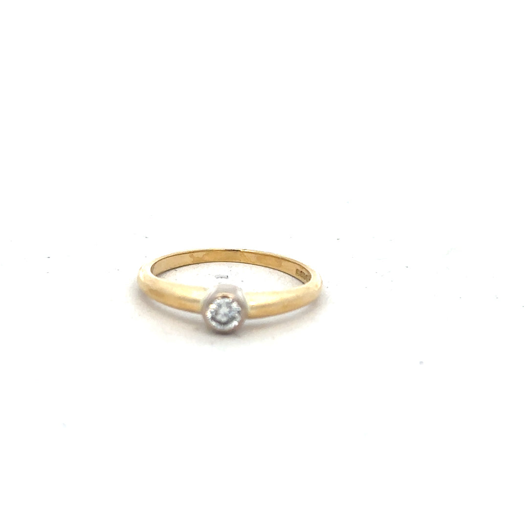 9ct yellow gold diamond ring in size K with sparkling diamonds, unbranded jewelry design, close-up view.
