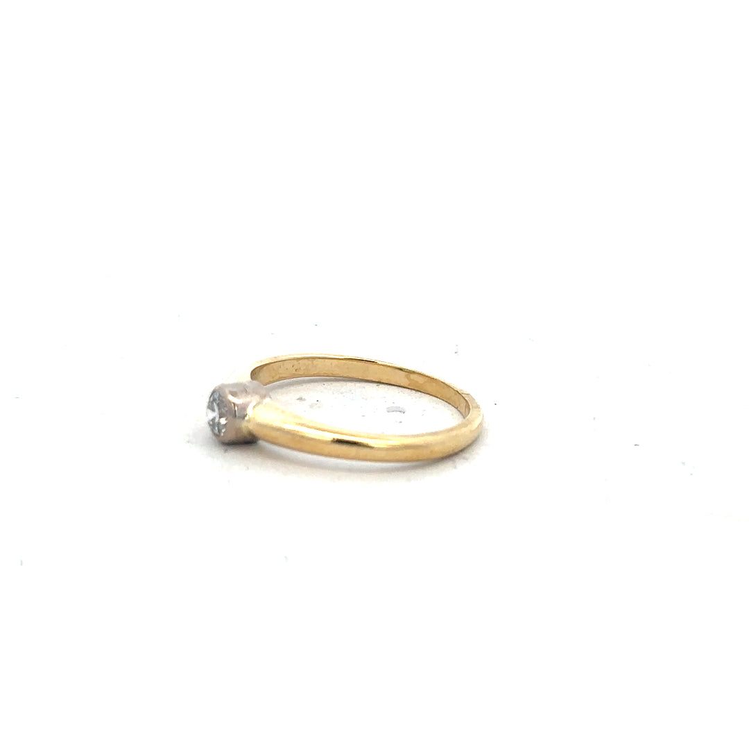9ct yellow gold diamond ring in size K with sparkling diamonds, unbranded jewelry, shown from a front view.