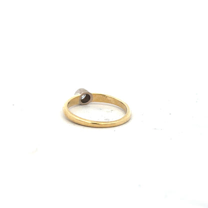 9ct yellow gold diamond ring in size K with sparkling diamonds, unbranded jewelry shown from a front view.