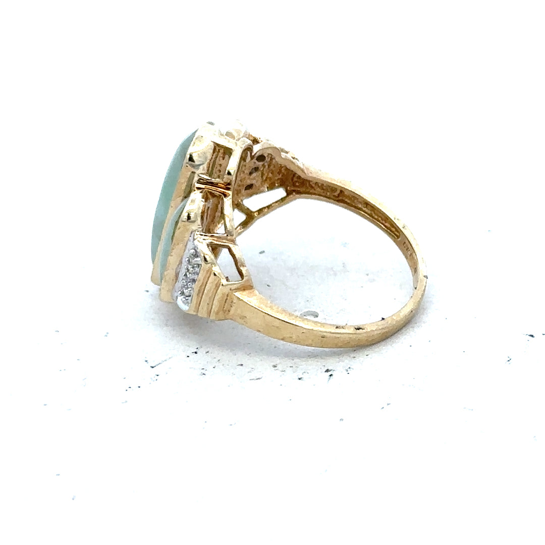 9ct yellow gold diamond ring in size K, featuring a sparkling diamond centerpiece and a polished gold band.