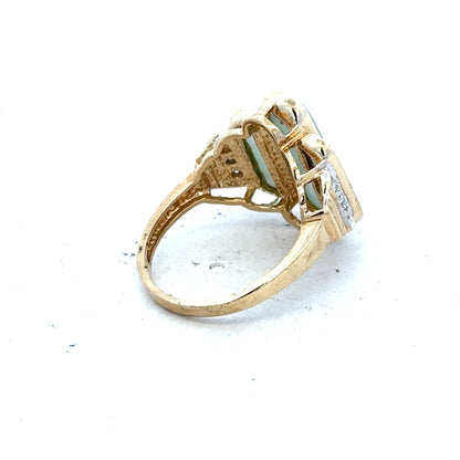 9ct yellow gold diamond ring in size K with sparkling diamonds, showcasing elegant jewelry design.