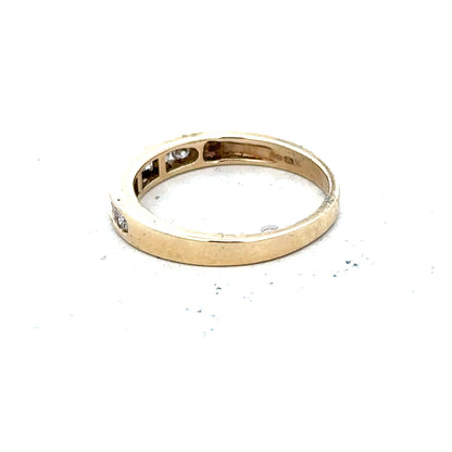 9ct yellow gold diamond ring in size K1/2 with sparkling diamonds on a plain white background.