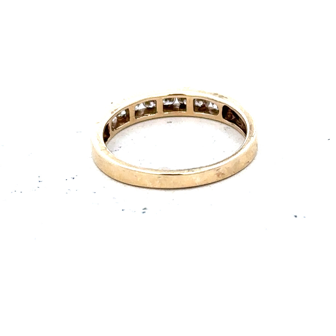 9ct yellow gold diamond ring size K1/2 with sparkling diamonds on a sleek band, unbranded jewelry image.