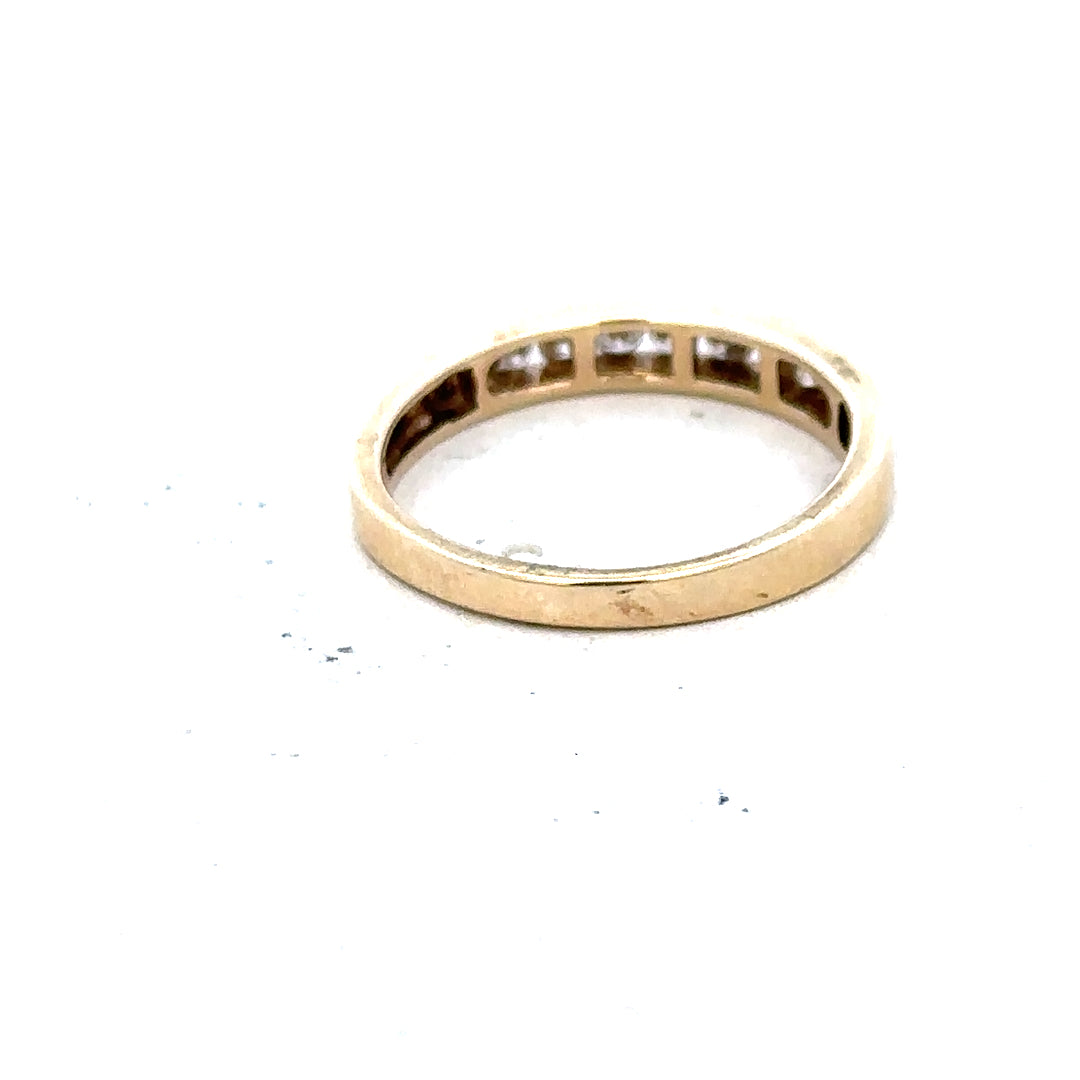 9ct yellow gold diamond ring in size K1/2, featuring a sparkling diamond setting and a classic, elegant design.