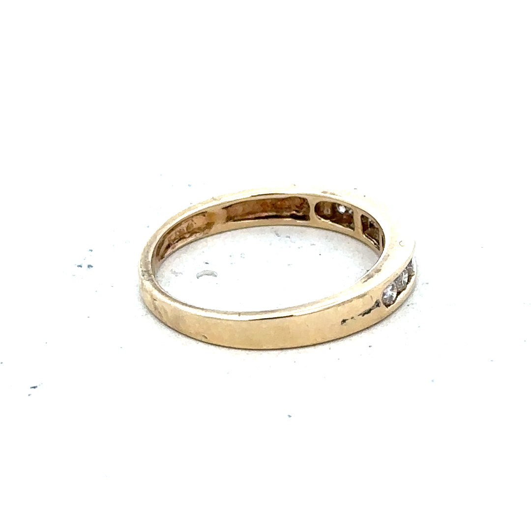 9ct yellow gold diamond ring size K1/2 with sparkling diamonds, showcasing a luxurious unbranded jewelry piece.