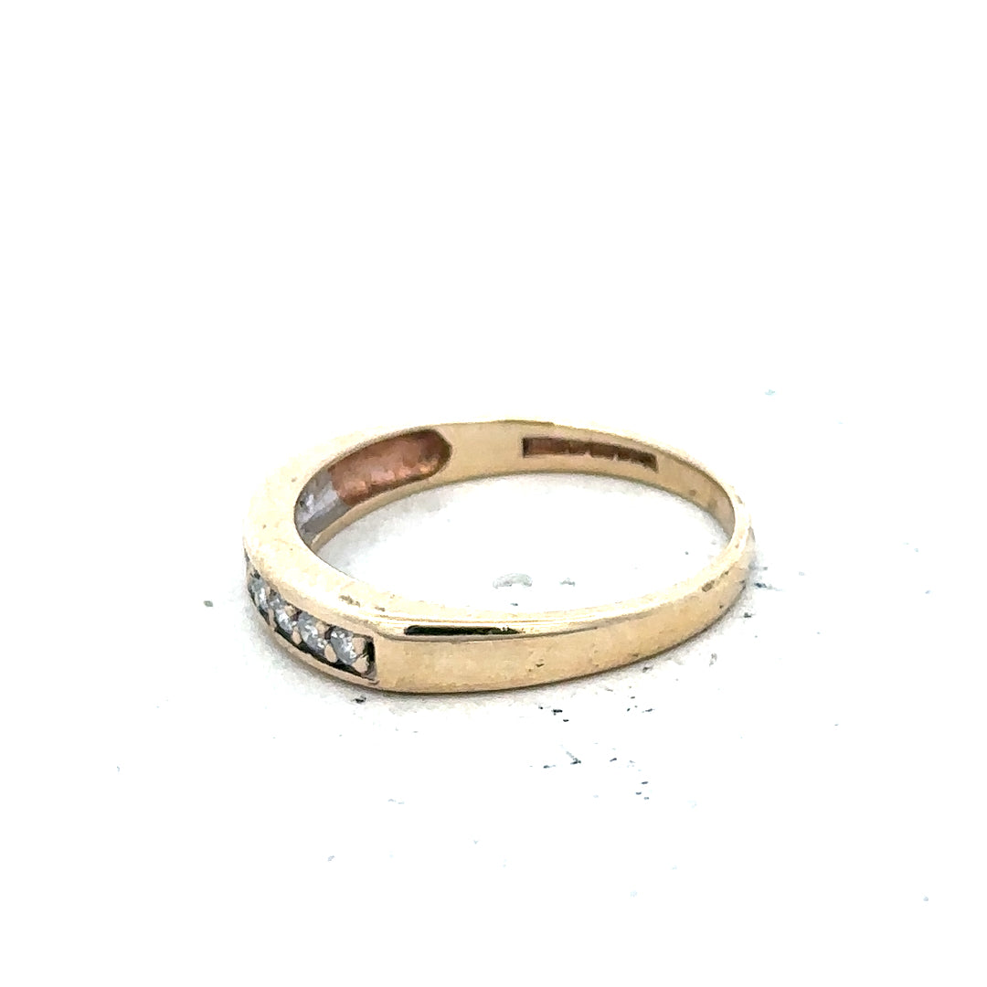 9ct yellow gold diamond ring in size K1/2 with sparkling diamonds, unbranded, showcasing a detailed close-up of the jewelry.
