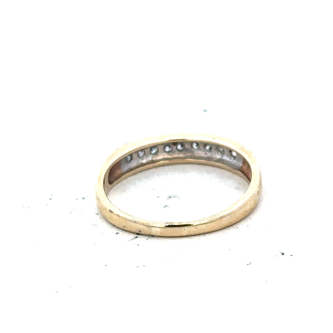 9ct yellow gold diamond ring in size K1/2 with sparkling diamonds, sleek and elegant jewelry design.
