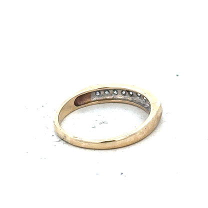 9ct yellow gold diamond ring in size K1/2 with sparkling diamonds, showcasing elegant jewelry design