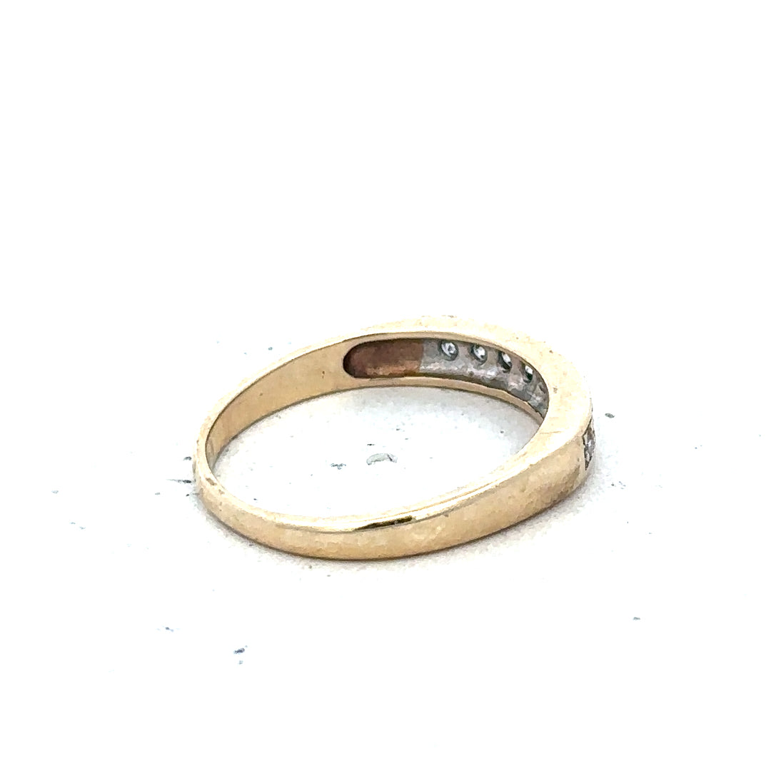 9ct yellow gold diamond ring in size K1/2 with sparkling diamonds, crafted by Unbranded.