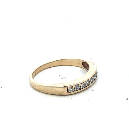 9ct yellow gold diamond ring size K1/2 with sparkling diamonds, showcasing a delicate and elegant design.