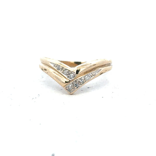 9ct yellow gold diamond ring in size L, featuring a sparkling diamond, unbranded jewelry displayed against a neutral background.