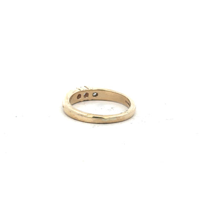9ct yellow gold diamond ring in size M with sparkling diamonds, unbranded jewelry displayed on a neutral background.