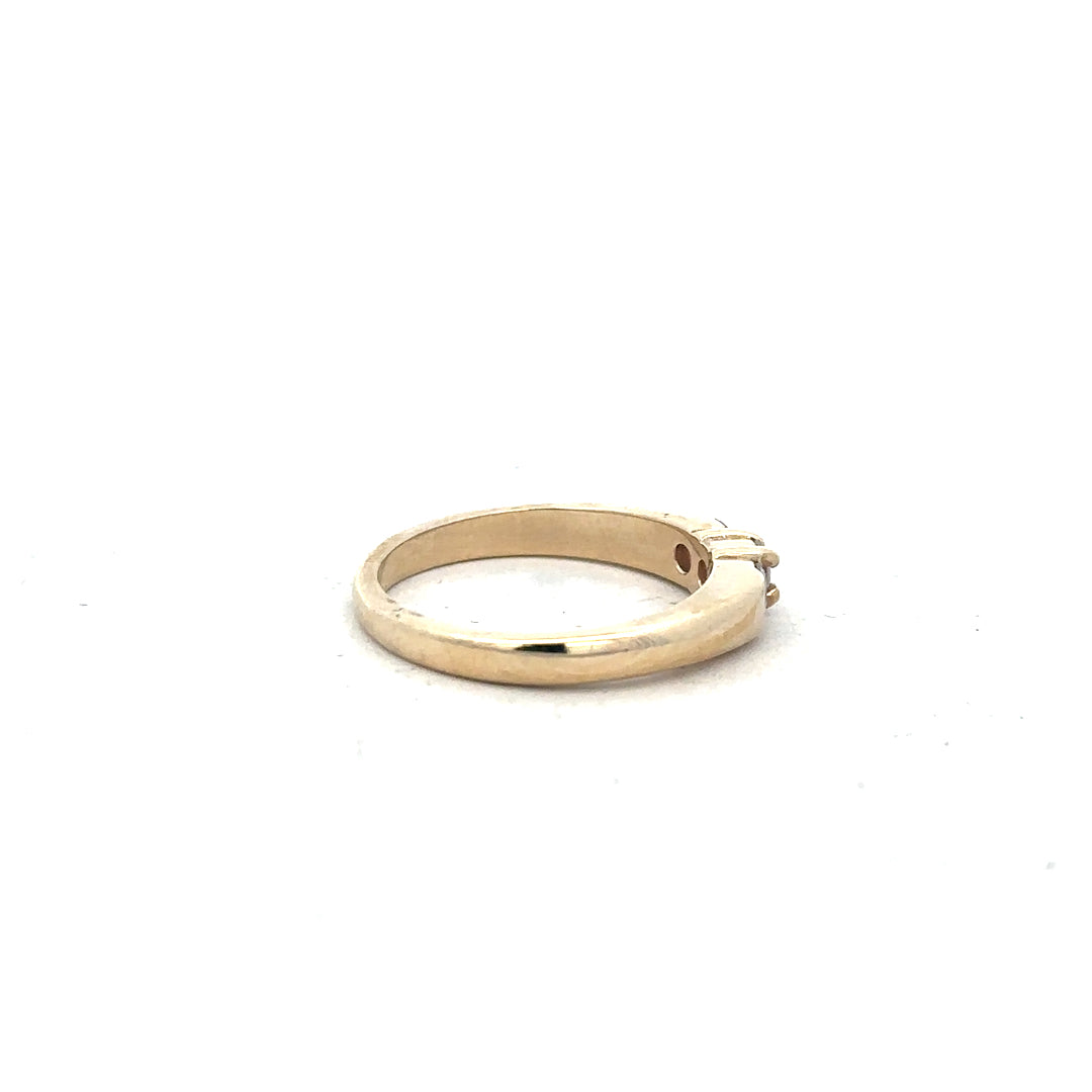 9ct yellow gold diamond ring in size M with sparkling diamonds, unbranded jewelry shown on a plain background.