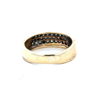 9ct yellow gold diamond ring in size M with a sparkling central diamond, unbranded jewelry displayed on a plain background.