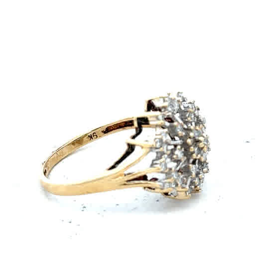 9ct yellow gold diamond ring in size M1/2 with a delicate design, weighing 2.4 grams. Unbranded jewelry piece.
