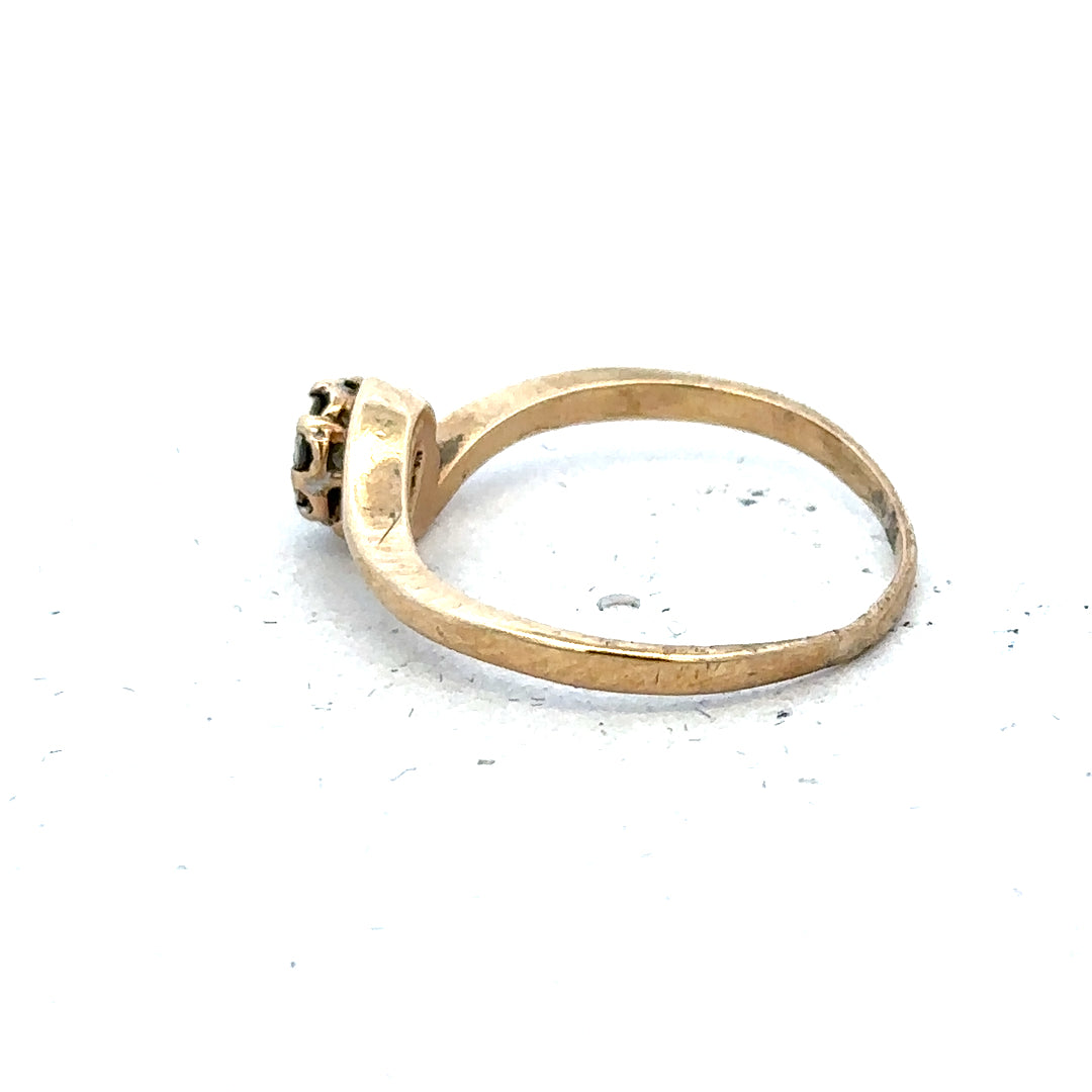 9ct yellow gold diamond ring in size M1/2 with sparkling diamonds set around the band.
