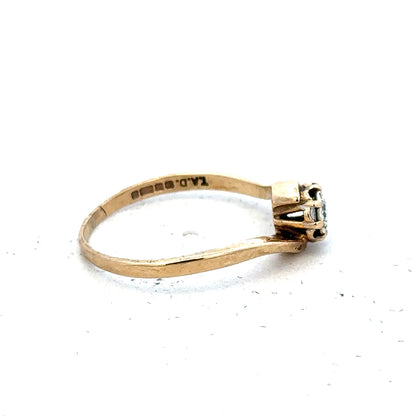 9ct yellow gold diamond ring in size M1/2, featuring a sparkling diamond set in a simple gold band.