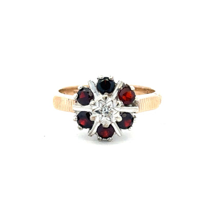 9ct yellow gold diamond ring in size M1/2 with sparkling diamonds, featuring an elegant design on a plain background.