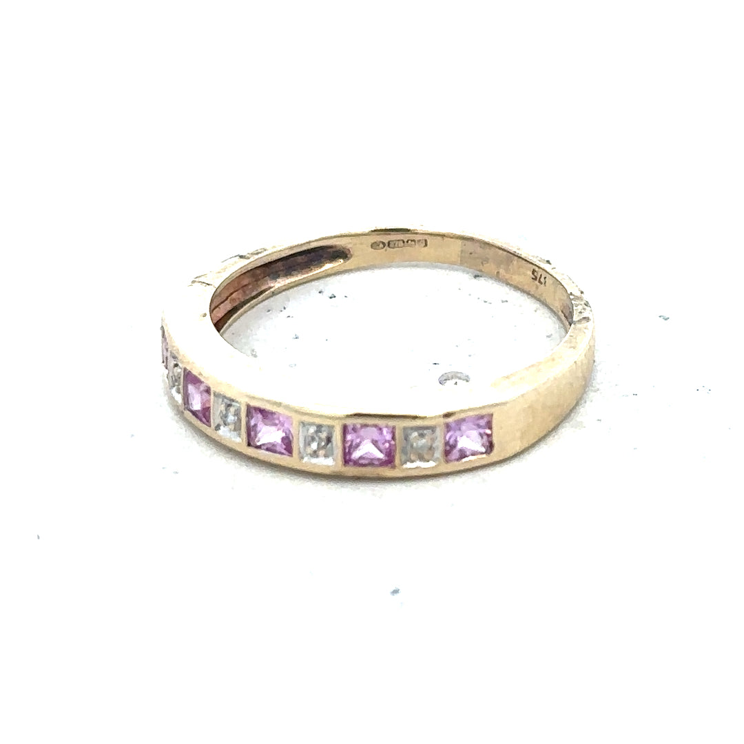 9ct yellow gold diamond ring in size N with a sparkling central diamond and intricate band design.