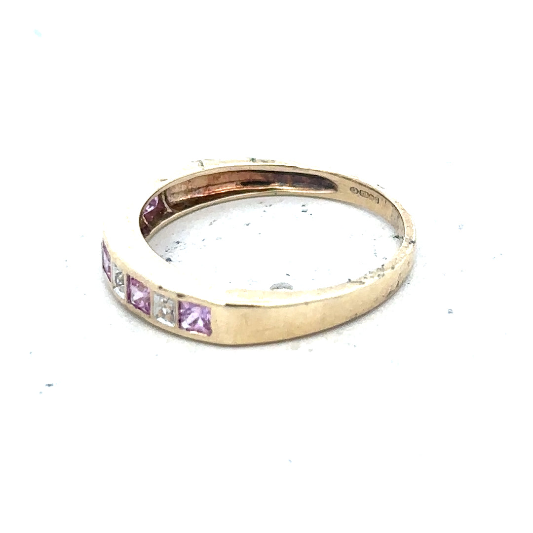 9ct yellow gold diamond ring in size N with a classic design, featuring sparkling diamonds on a polished gold band.