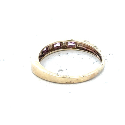 9ct yellow gold diamond ring size N with a sparkling diamond and elegant band, showcasing fine craftsmanship.