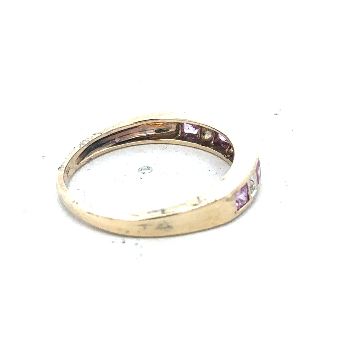 9ct yellow gold diamond ring in size N with a sparkling central diamond, elegant and stylish jewelry piece.