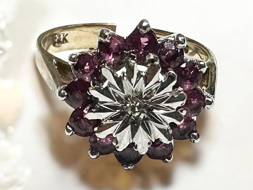 9ct yellow gold diamond ring in size N with a sparkling central diamond and elegant band.