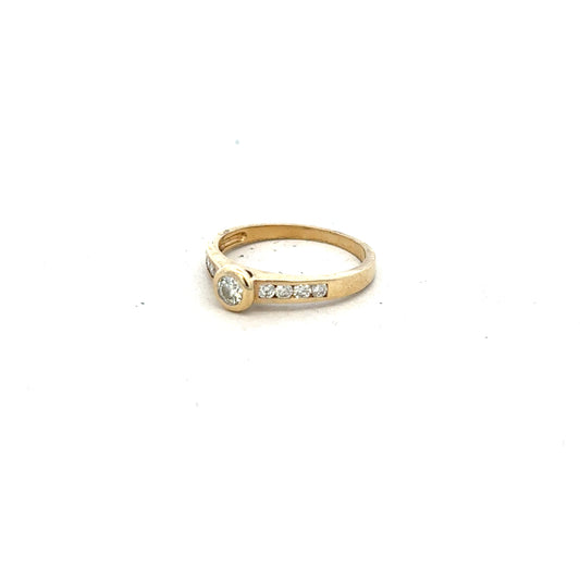 9ct yellow gold diamond ring in size N, featuring a sparkling diamond setting and a classic design.