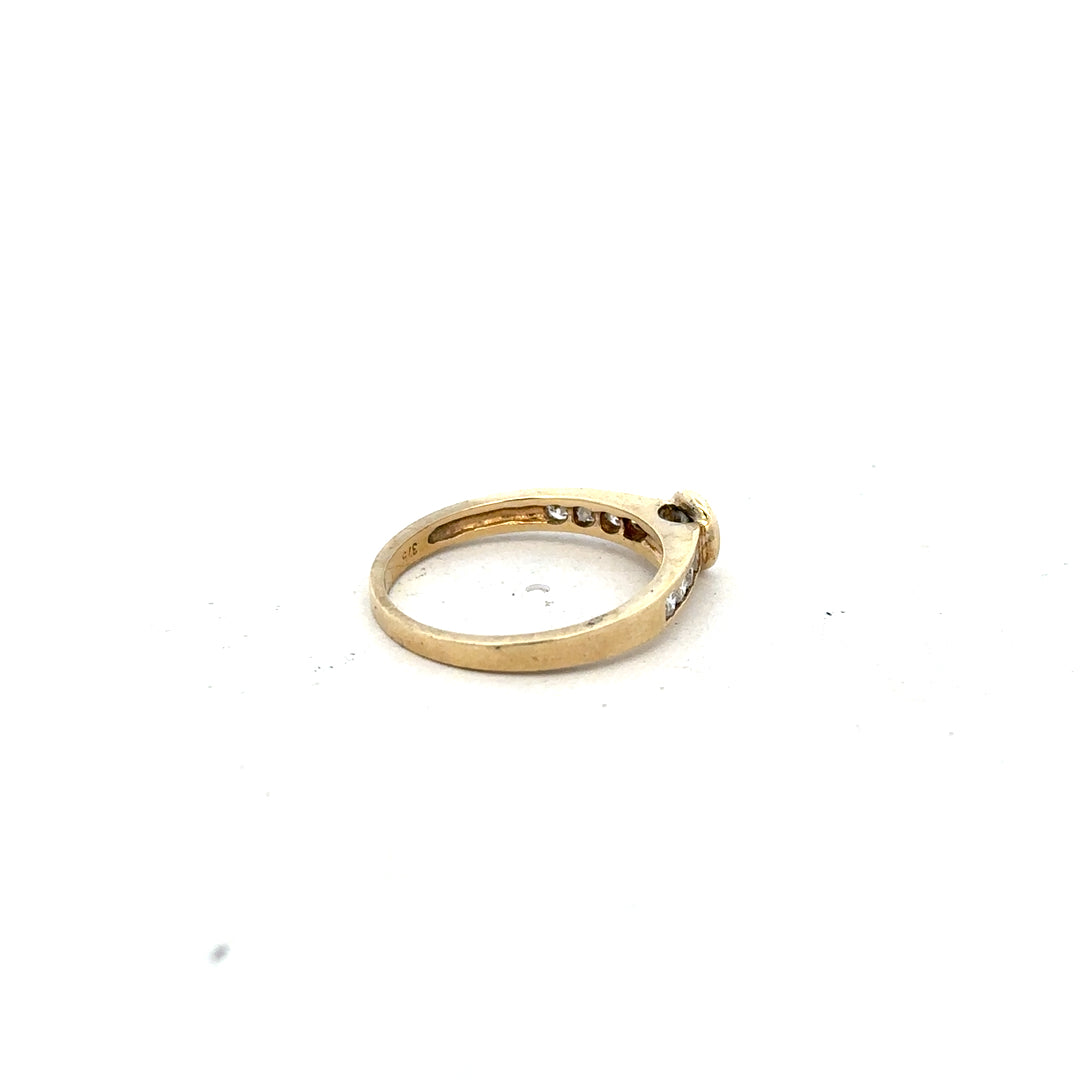 9ct yellow gold diamond ring size N with sparkling diamonds, crafted in elegant gold setting.