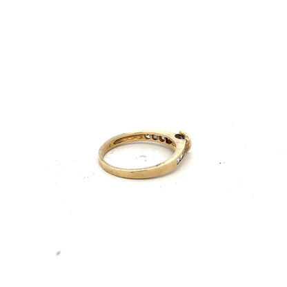 9ct yellow gold diamond ring size N with sparkling diamonds, crafted in elegant gold setting.