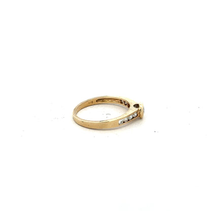 9ct yellow gold diamond ring in size N with sparkling diamonds, showcasing elegant jewelry craftsmanship.
