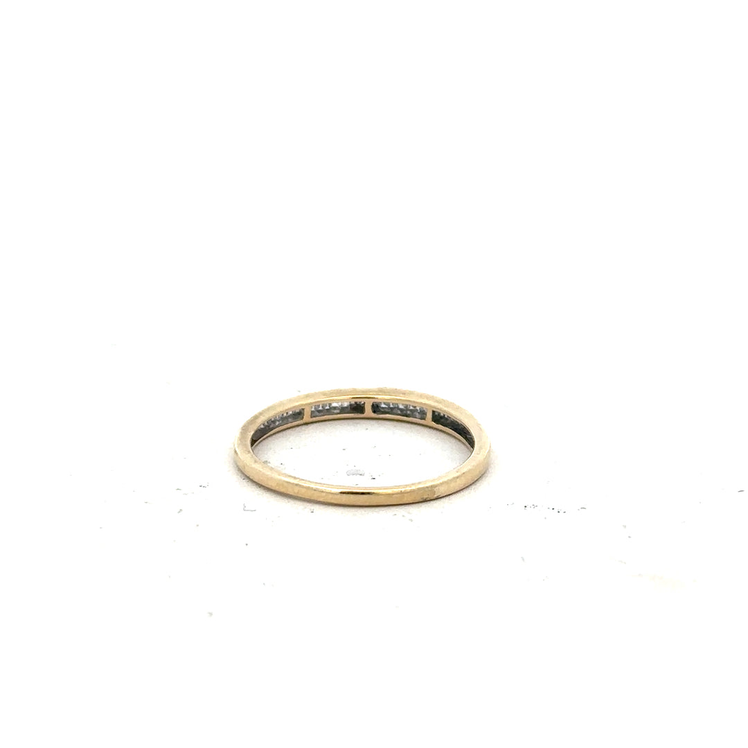 9ct yellow gold diamond ring in size N1/2 with sparkling diamonds, showcasing elegant jewelry craftsmanship.