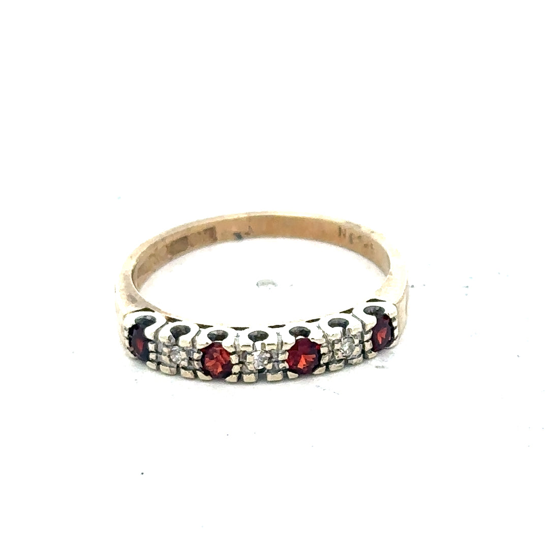 9ct yellow gold diamond ring in size O, featuring a sparkling central diamond and a polished gold band.