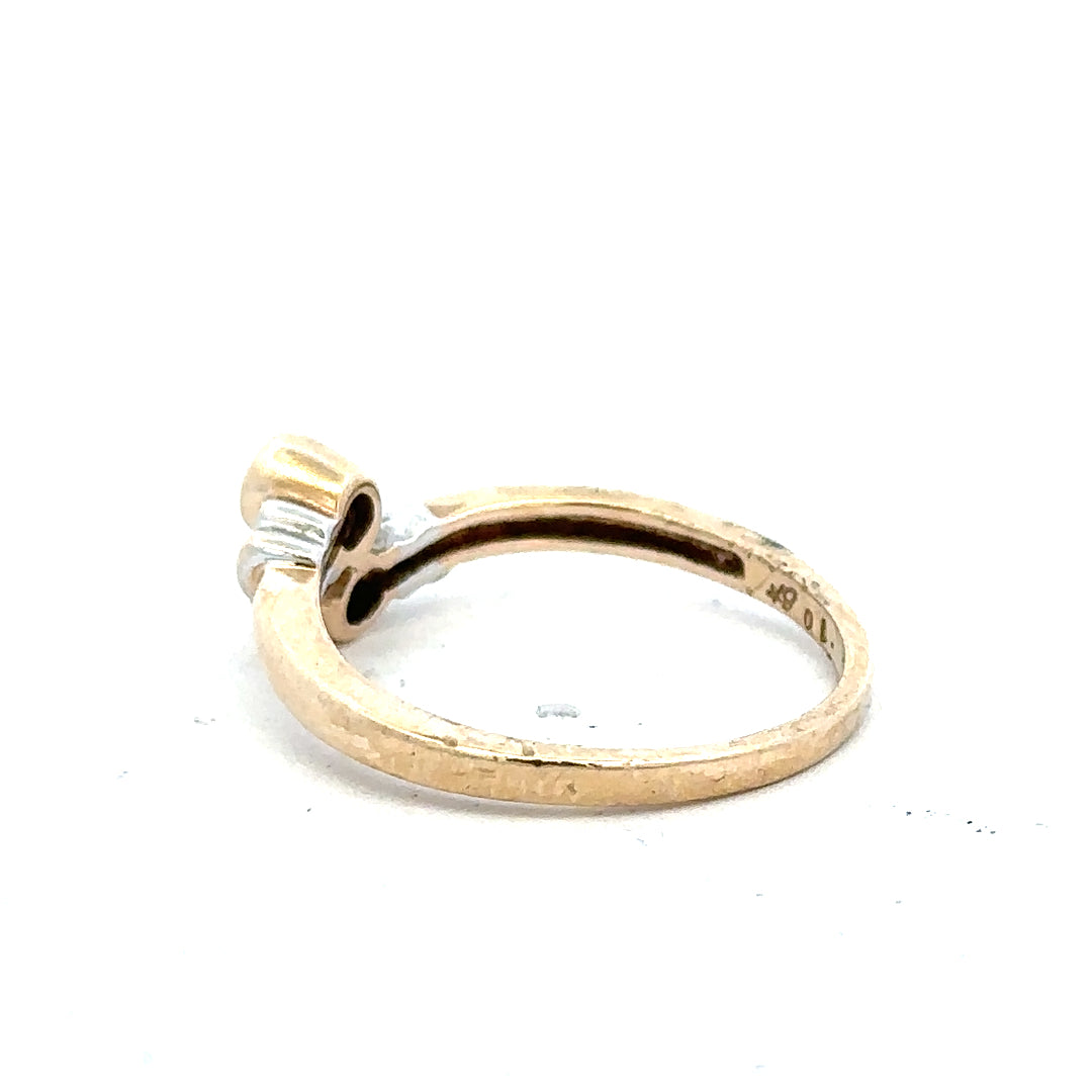 9ct yellow gold diamond ring in size O with sparkling diamonds, featuring a sleek, elegant design.