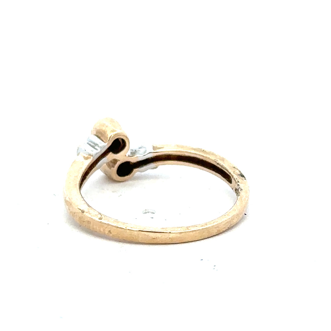 9ct yellow gold diamond ring in size O with sparkling diamonds, showcasing an elegant jewelry design.