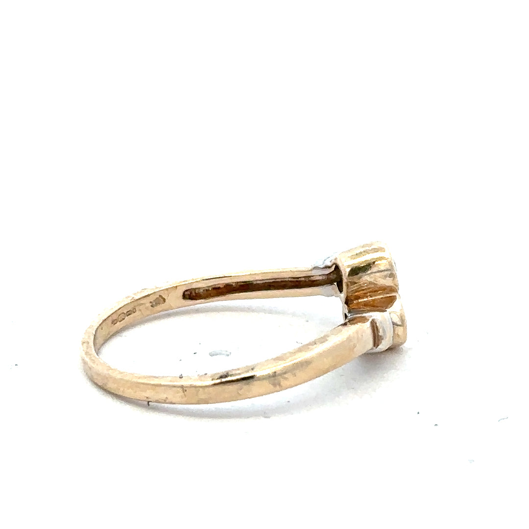 9ct yellow gold diamond ring size O with sparkling diamonds, showcasing elegant craftsmanship and a polished band.
