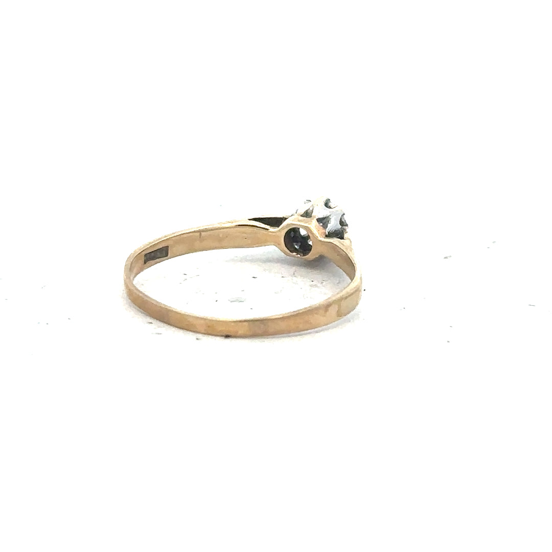9ct yellow gold diamond ring in size O with sparkling diamonds, unbranded jewelry displayed on a plain background.