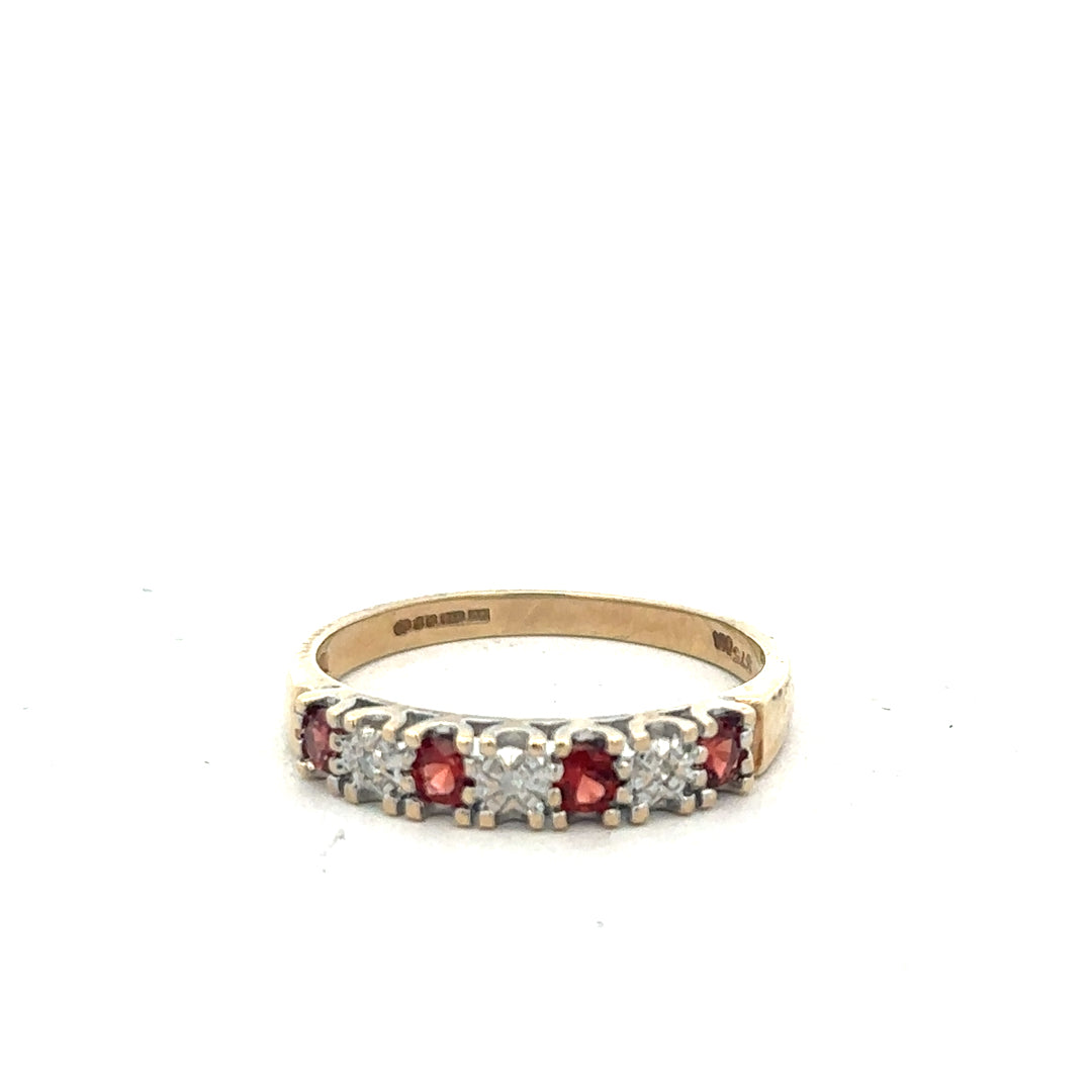 9ct yellow gold diamond ring in size O1/2, featuring a sparkling central diamond and elegant band design.
