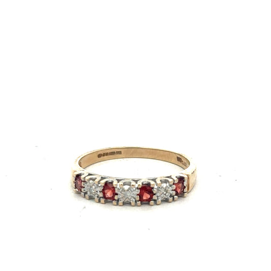9ct yellow gold diamond ring in size O1/2, featuring a sparkling central diamond and elegant band design.