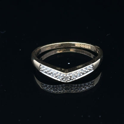 9ct yellow gold diamond ring in size P, featuring a sparkling diamond setting and a classic band design.