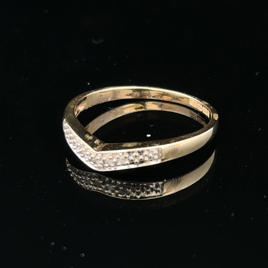 9ct yellow gold diamond ring in size P with sparkling diamonds, showcasing a classic and elegant jewelry design.