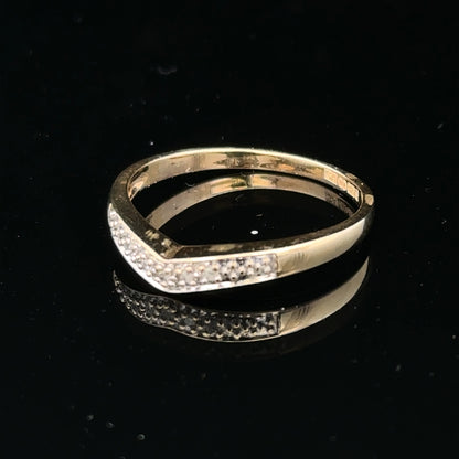 9ct yellow gold diamond ring in size P with sparkling diamonds, showcasing a classic and elegant jewelry design.