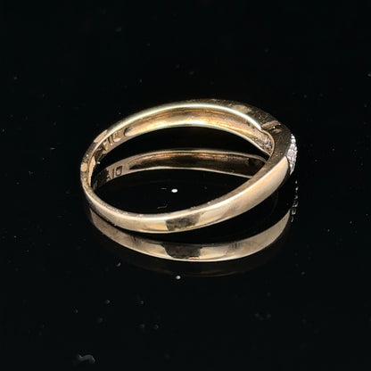 9ct yellow gold diamond ring in size P with a sparkling central diamond and delicate band design.