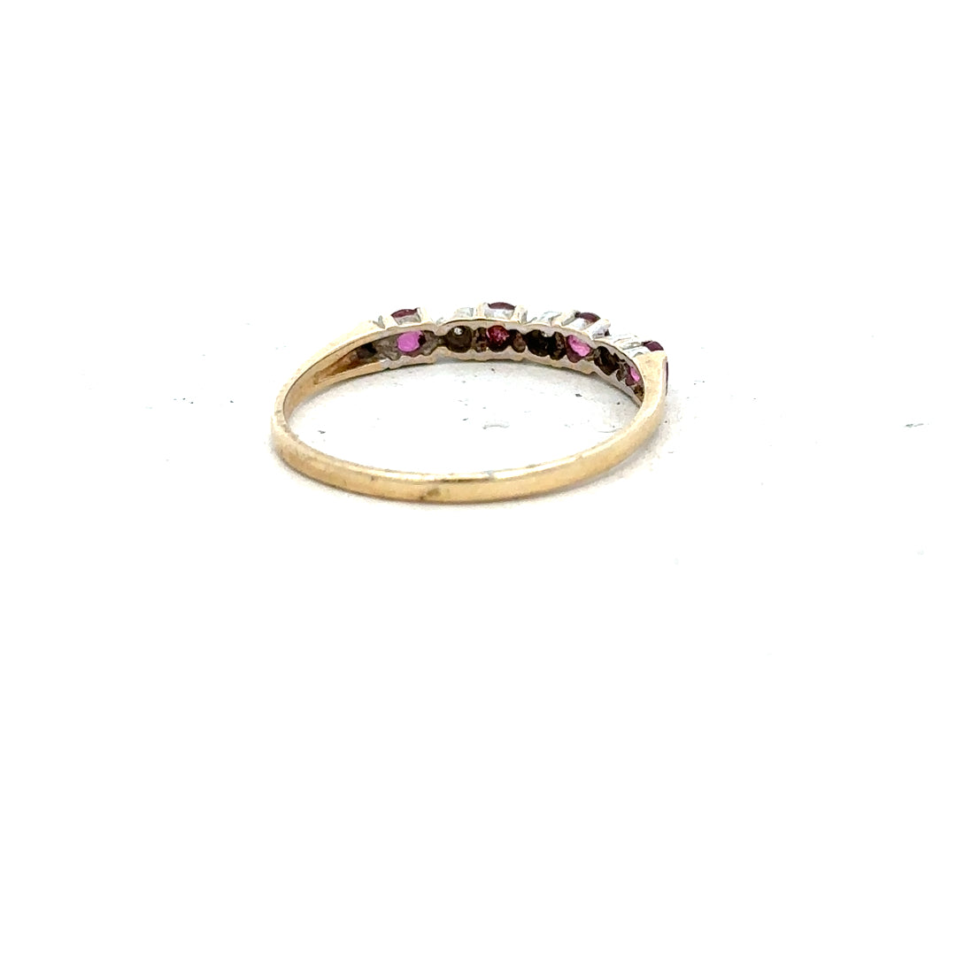 9ct yellow gold diamond ring in size P with sparkling diamonds, unbranded jewelry piece displayed on a neutral background.