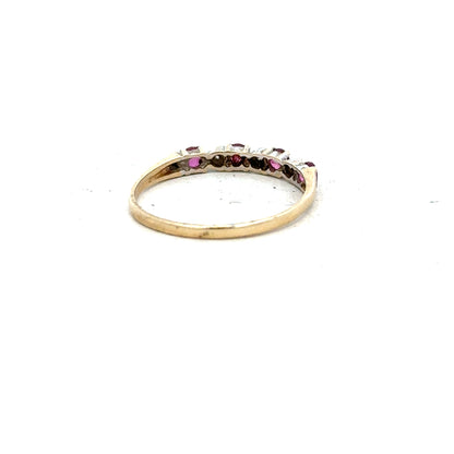 9ct yellow gold diamond ring in size P with sparkling diamonds, unbranded jewelry piece displayed on a neutral background.