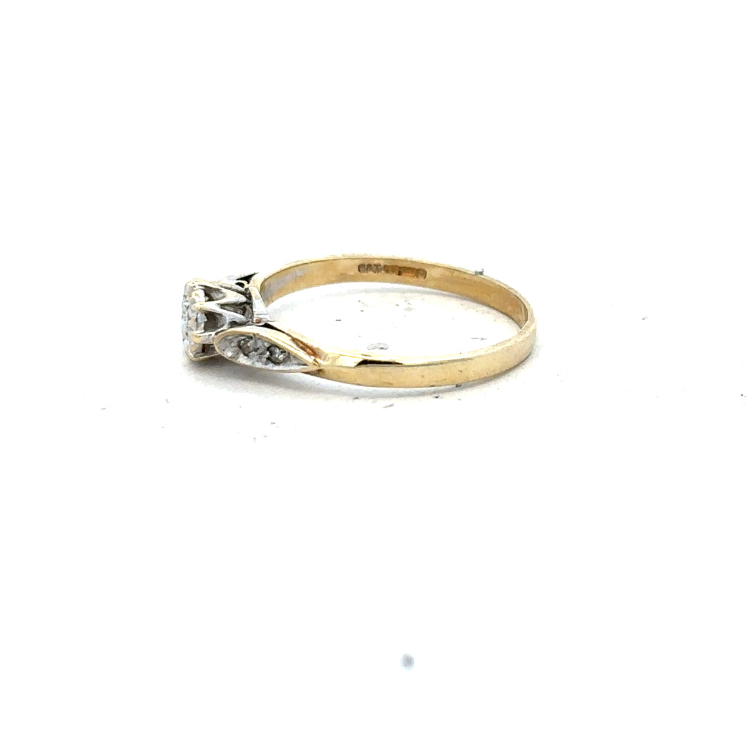 9ct yellow gold diamond ring in size P with sparkling diamonds, showcasing elegant jewelry craftsmanship.